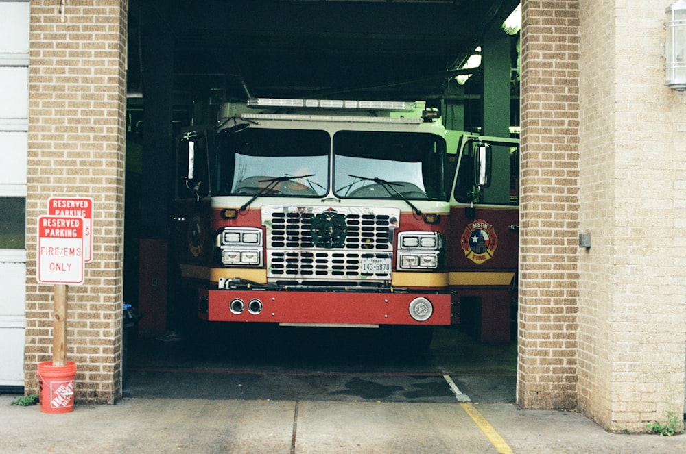 a fire truck is parked in a garage