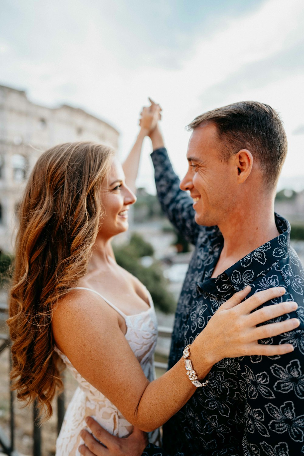 a man and a woman are dancing together