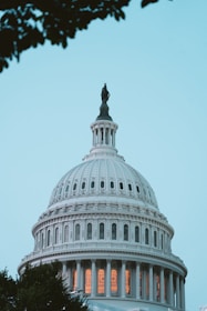 the dome of the u s capitol building at dusk