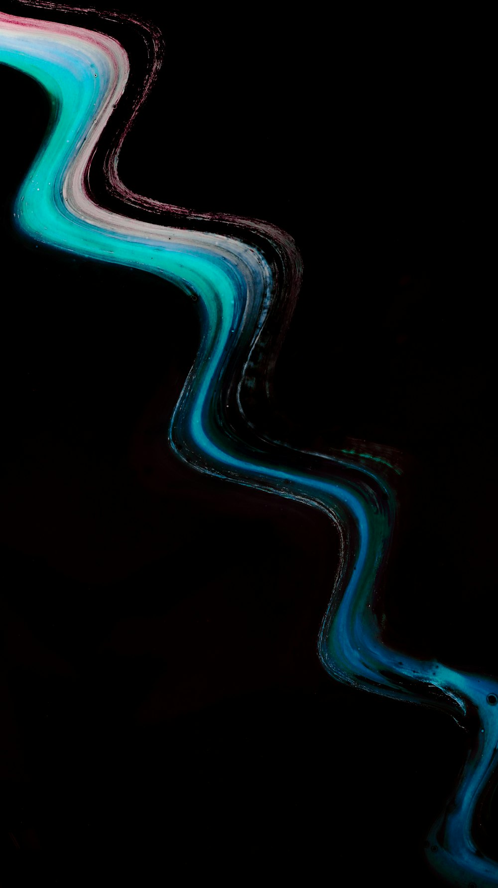 a black background with blue and green lines