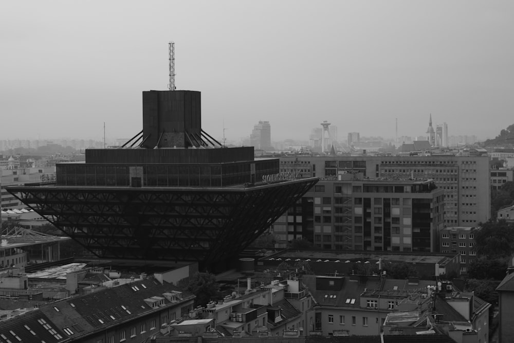 a black and white photo of a very tall building