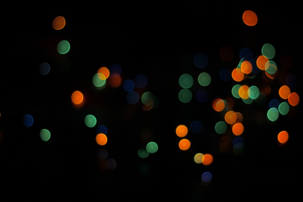 a blurry photo of a bunch of lights in the dark