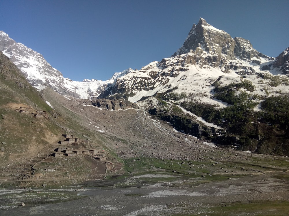 a mountain range with snow on top of it