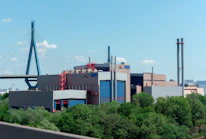 Modern industrial facility with clean technology and green surroundings.