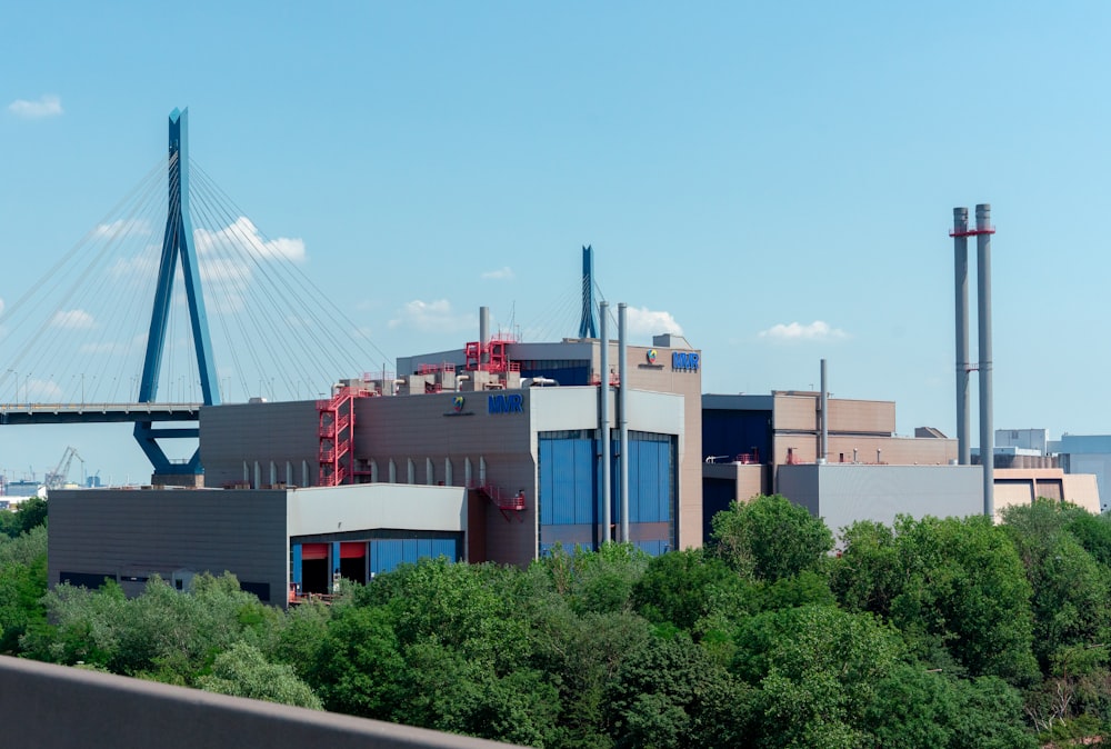 a building with a bridge in the background