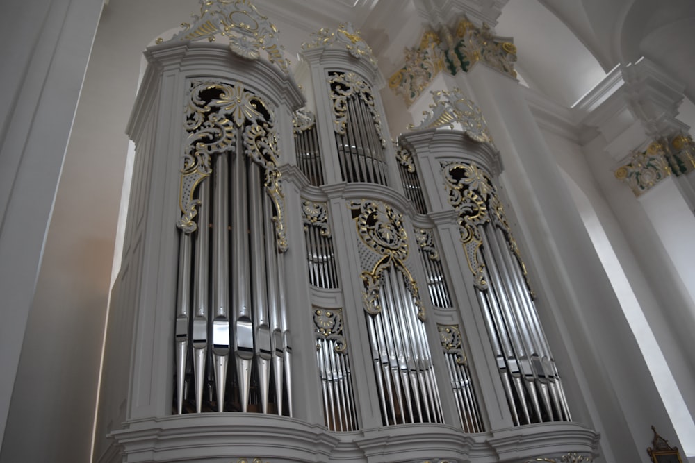 an ornate pipe organ in a church