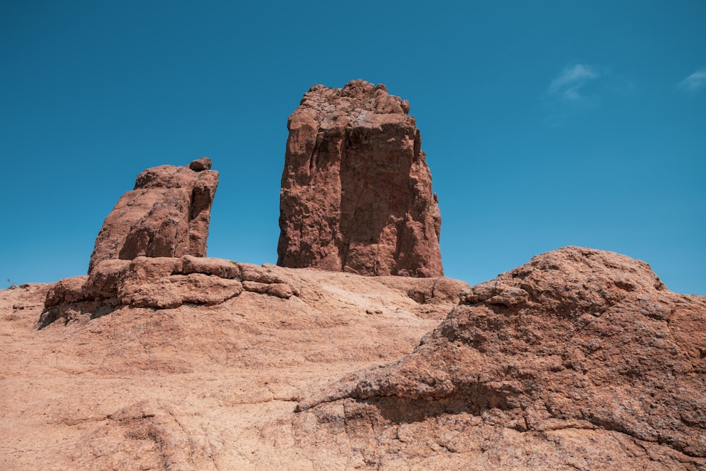 a rock formation in the middle of a desert