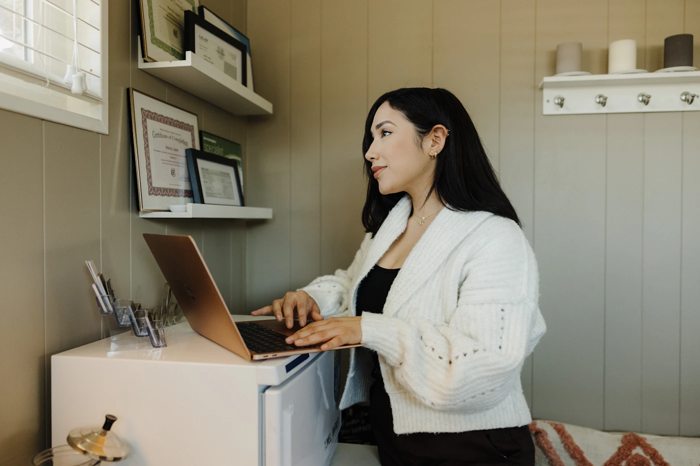 Business owner working at a laptop