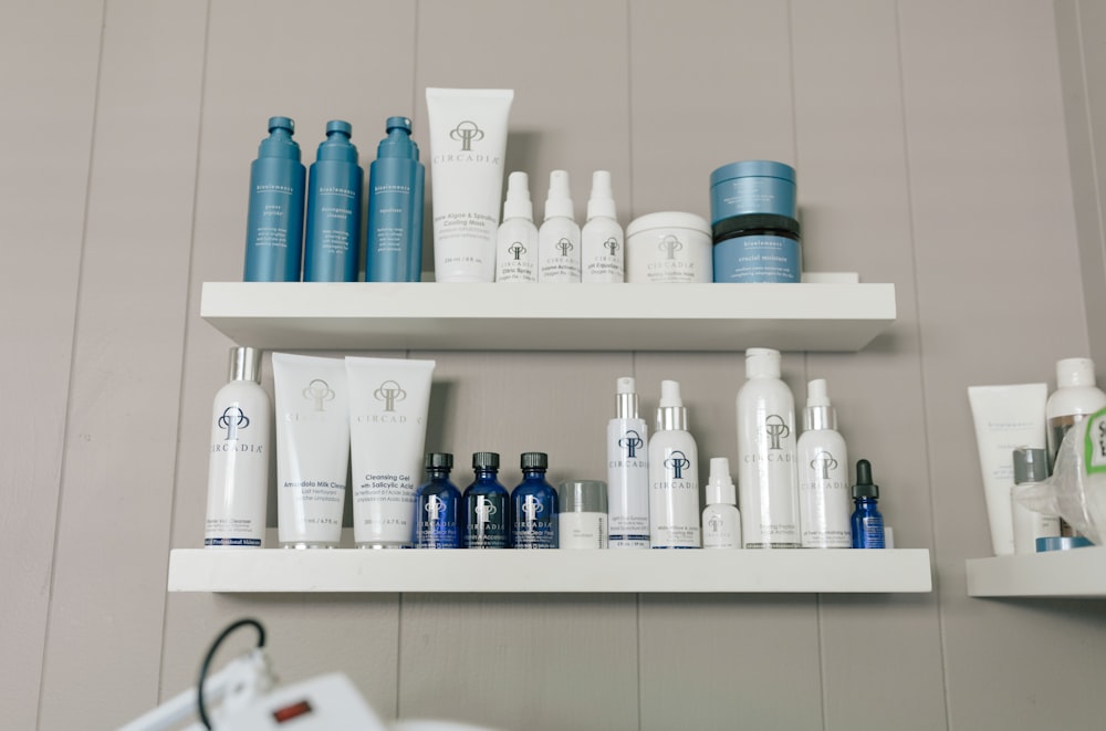 a shelf filled with lots of different types of skin care products