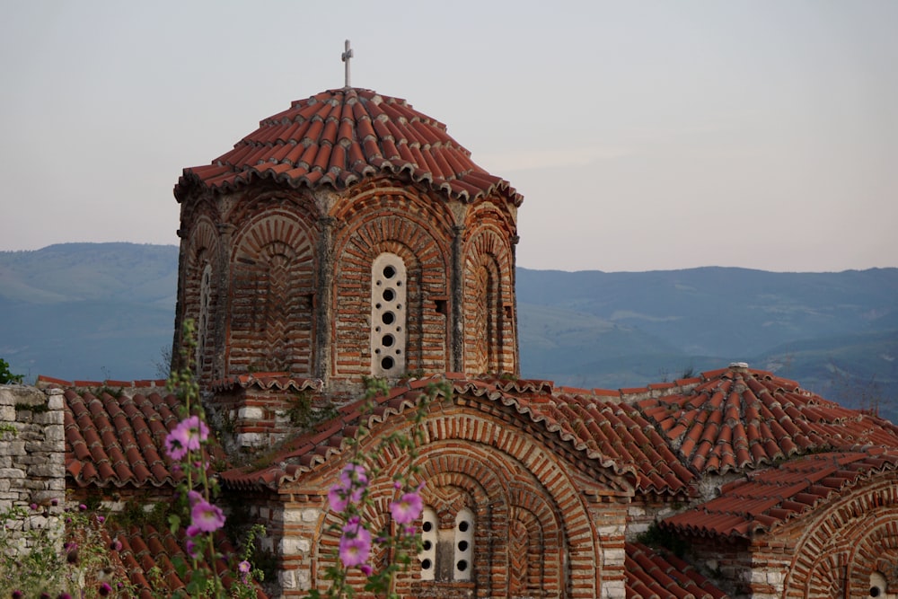 a building with a cross on top of it