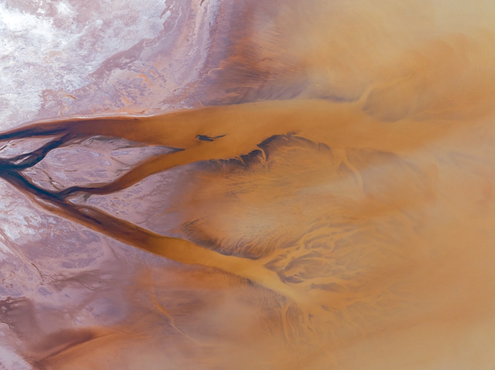 an aerial view of a yellow and brown area