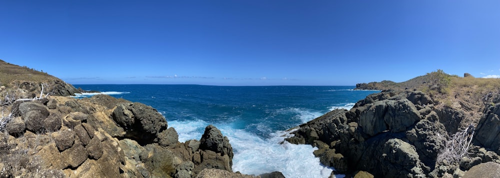 a view of the ocean from the top of a mountain