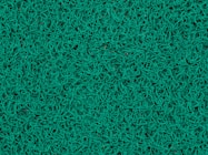 a close up of a green surface with lots of lines