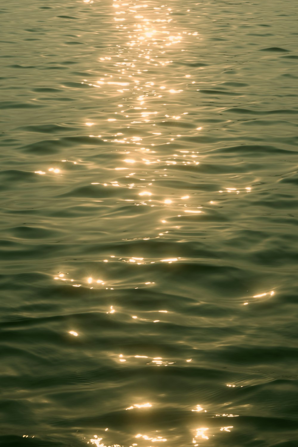 the sun shines on the water as it reflects off the water