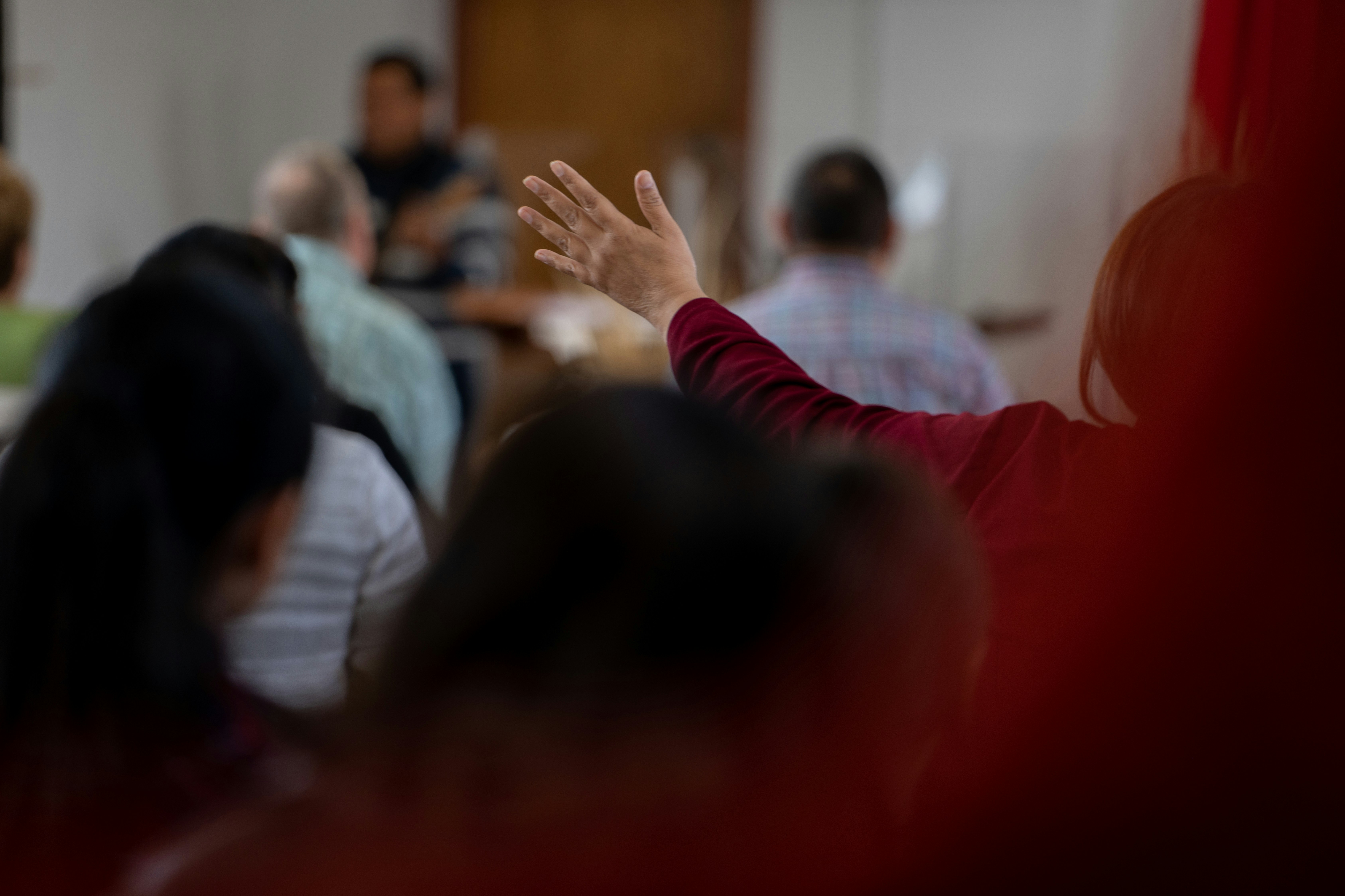 a group of people sitting in a room