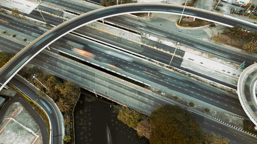 an aerial view of a highway intersection with multiple lanes