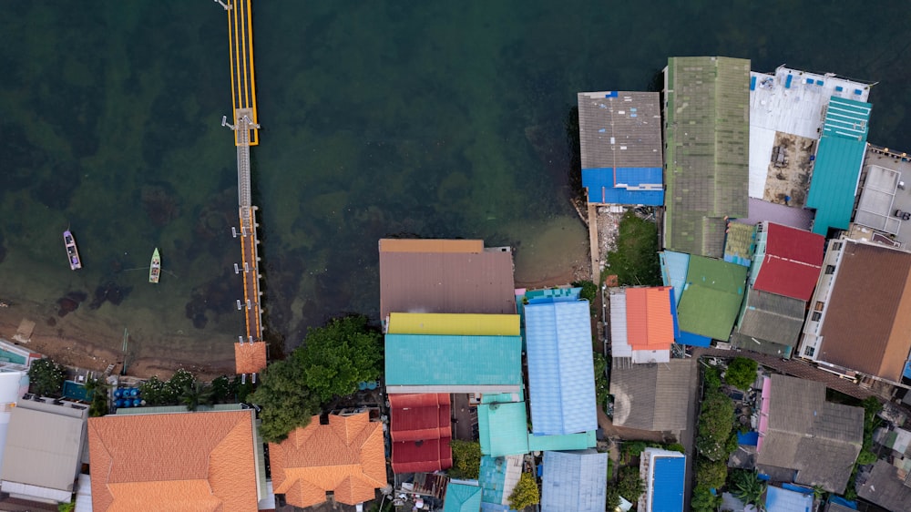 a bird's eye view of a city with a body of water