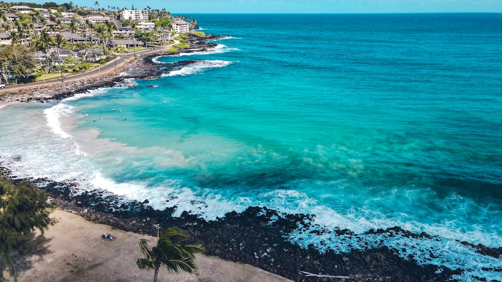 an aerial view of a beach and ocean