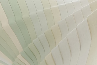 A close-up of layered colors blending softly, highlighting delicate light reflections.