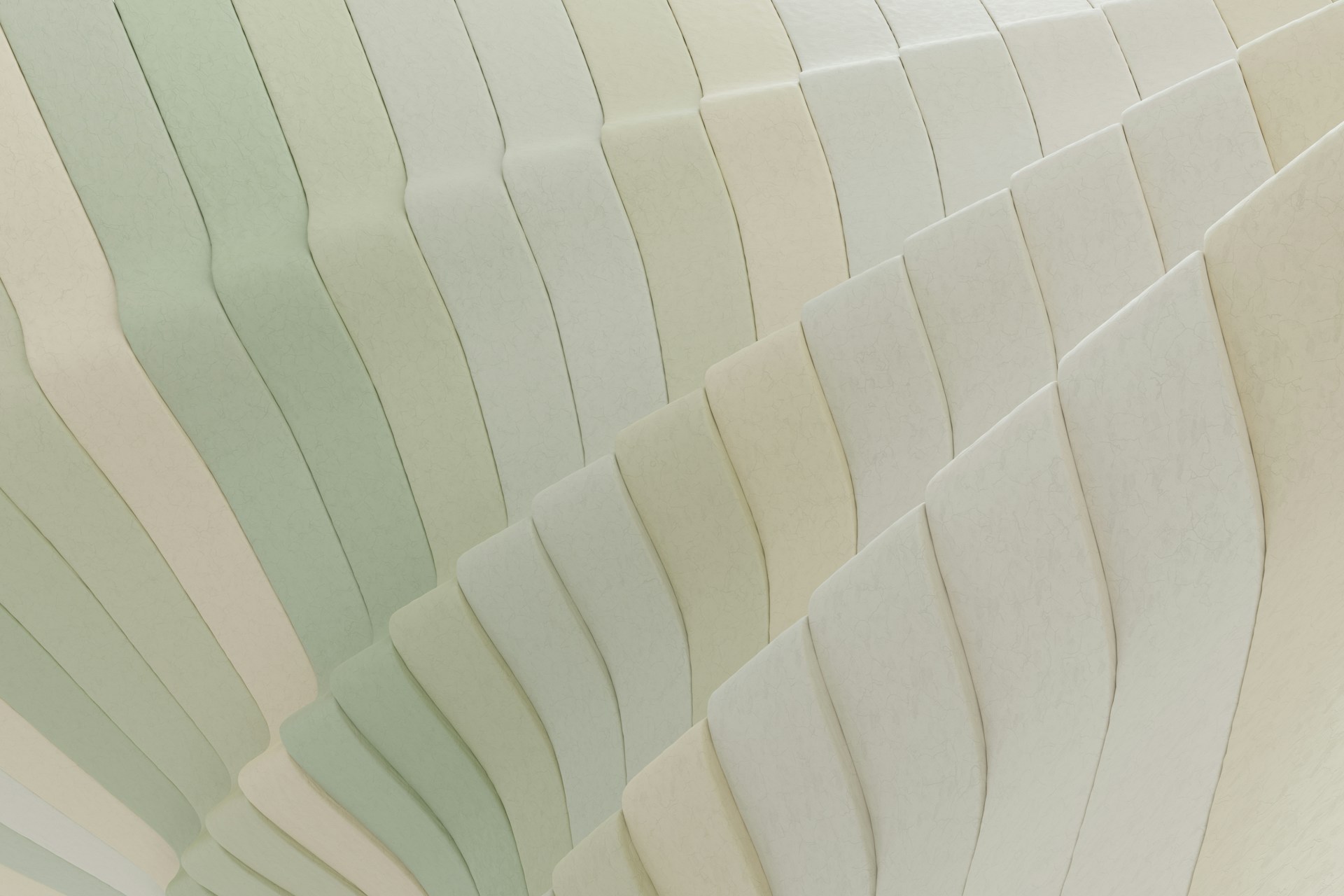 A close-up of textured animation cells layered to reveal the intricate process behind a fluid motion scene.