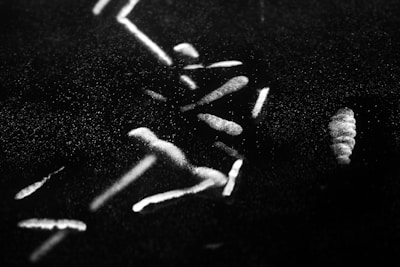 Detailed image of dispersed zinc oxide nanoparticles on a dark background.