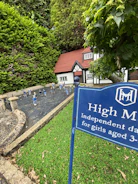 Young learners building a model village with recycled materials.