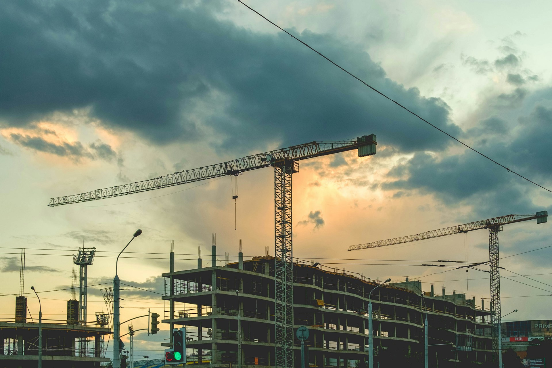 woman wearing yellow long-sleeved dress under white clouds and blue sky during daytime