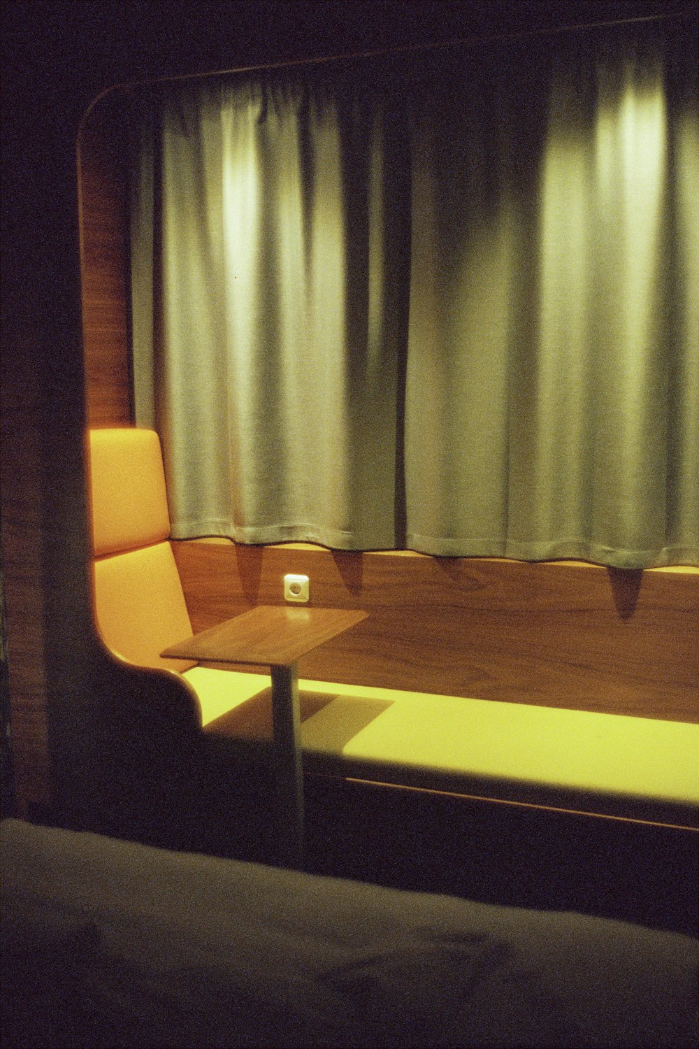 a chair and a table in a room