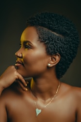 a woman with a necklace on her neck