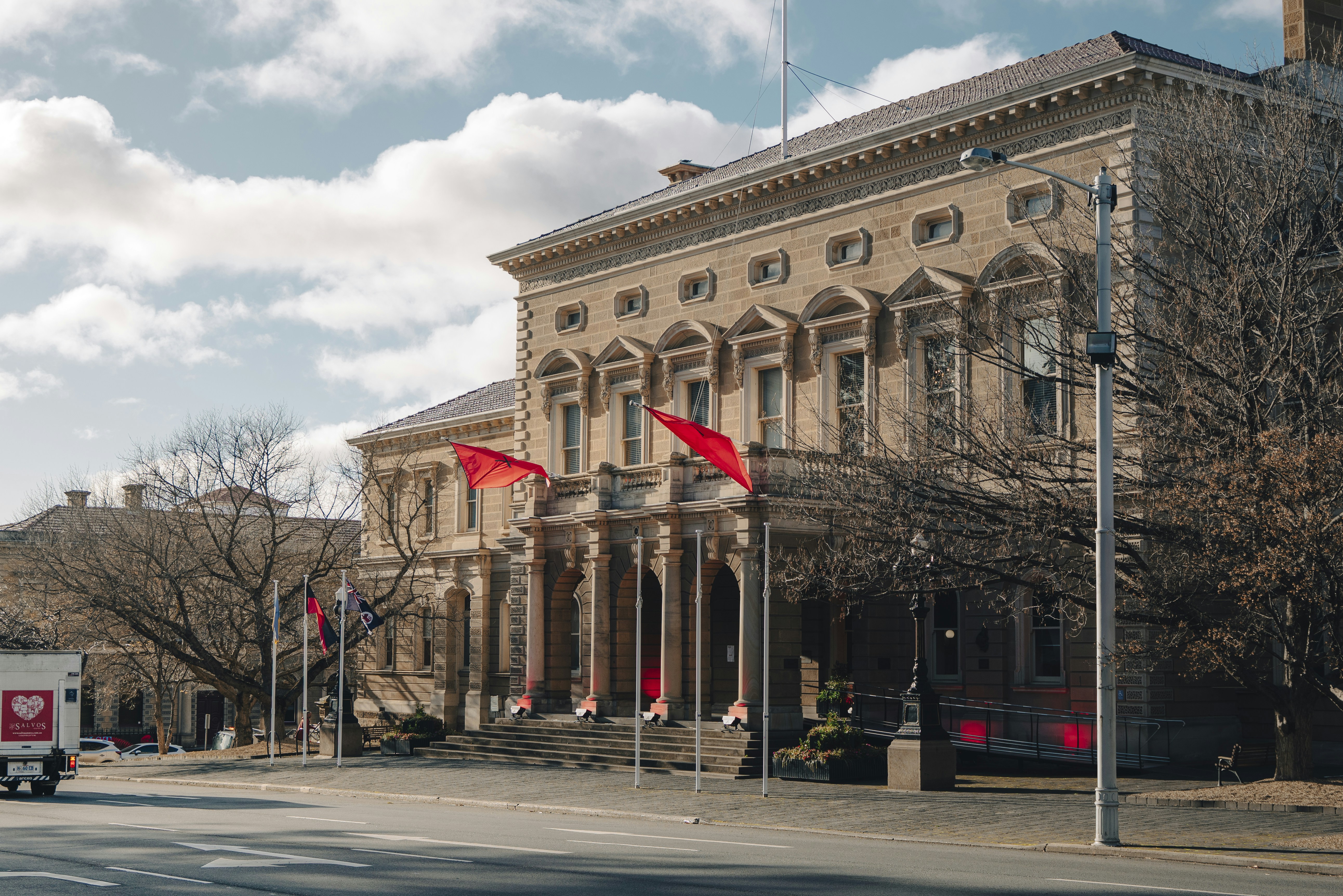 a large building with a flag on top of it