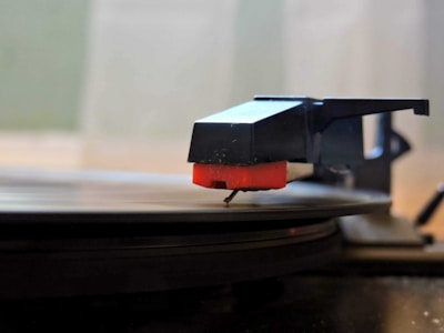 a close up of a record player on a table