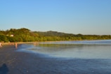 A serene beach in Goa at sunset, reflecting the coastal Konkani lifestyle.