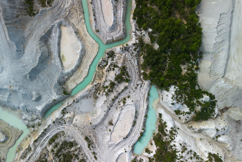 an aerial view of a river running through a valley