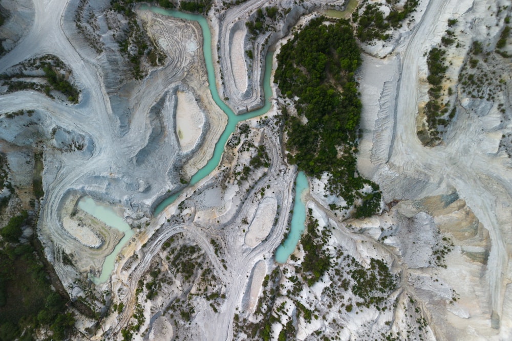 an aerial view of a river running through a valley