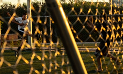 A young soccer player celebrating a goal, captured with AI-enhanced clarity.