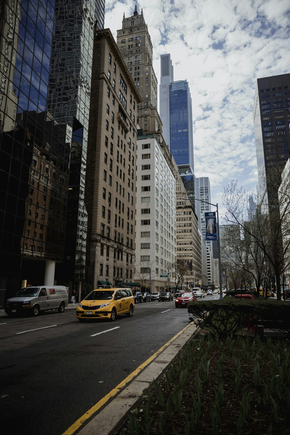 a city street filled with lots of tall buildings