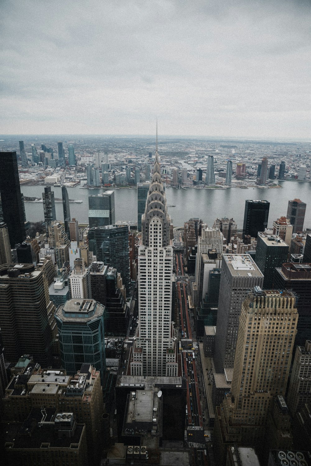 an aerial view of a city with tall buildings