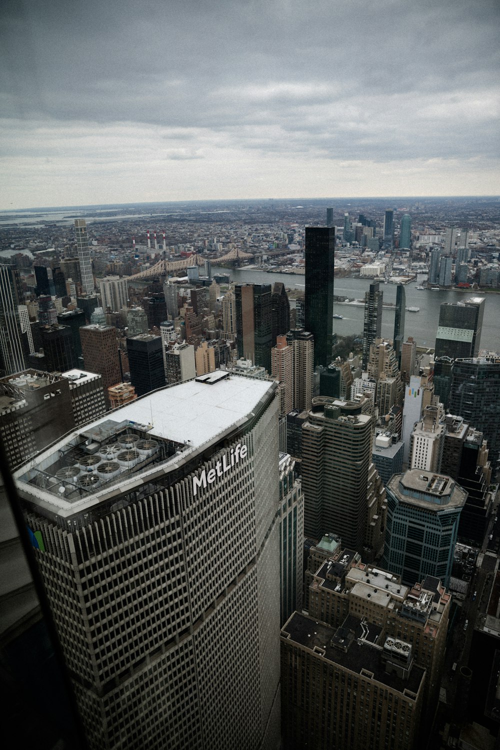 a view of a city from the top of a building