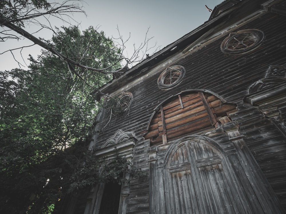 an old building with a wooden door and window