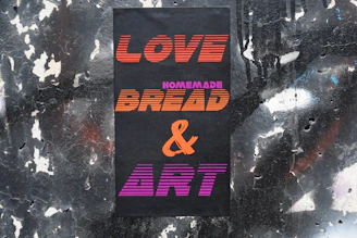 A vibrant digital poster designed for a local bakery showcasing fresh bread.