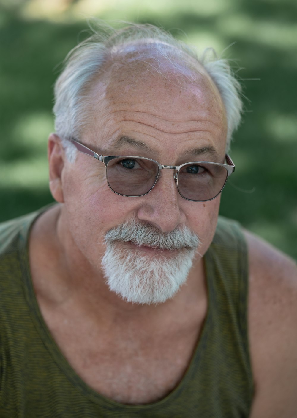 a man with a white beard wearing sunglasses