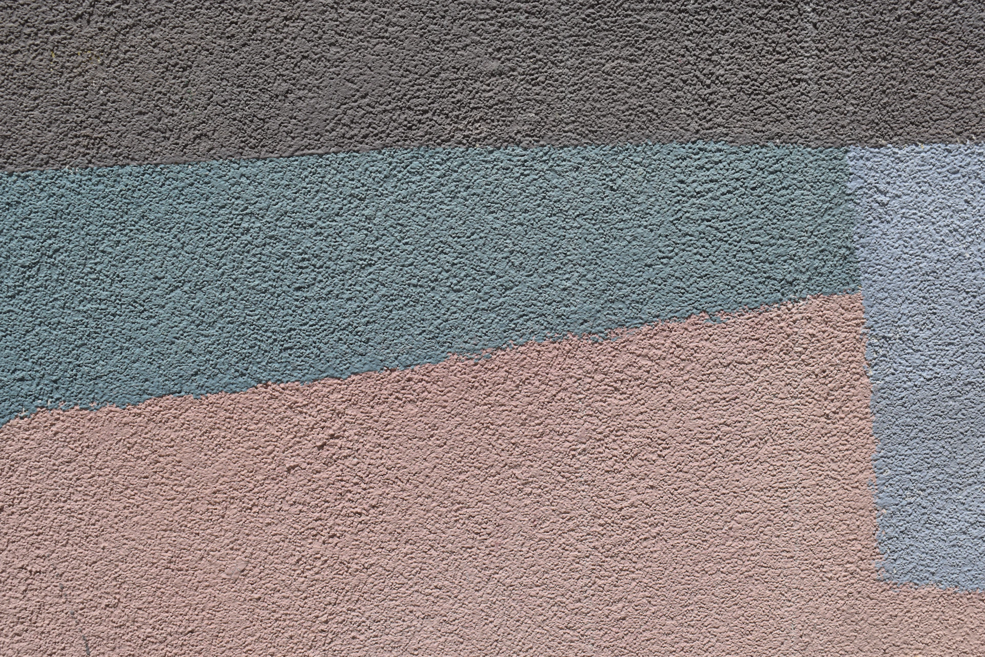 a close up of a wall with a clock on it