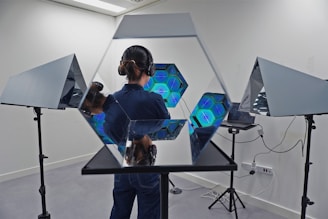 Portrait of Erik Dravik working on a futuristic film set surrounded by AI-generated visuals.