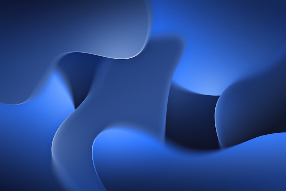 a blue abstract background with wavy shapes