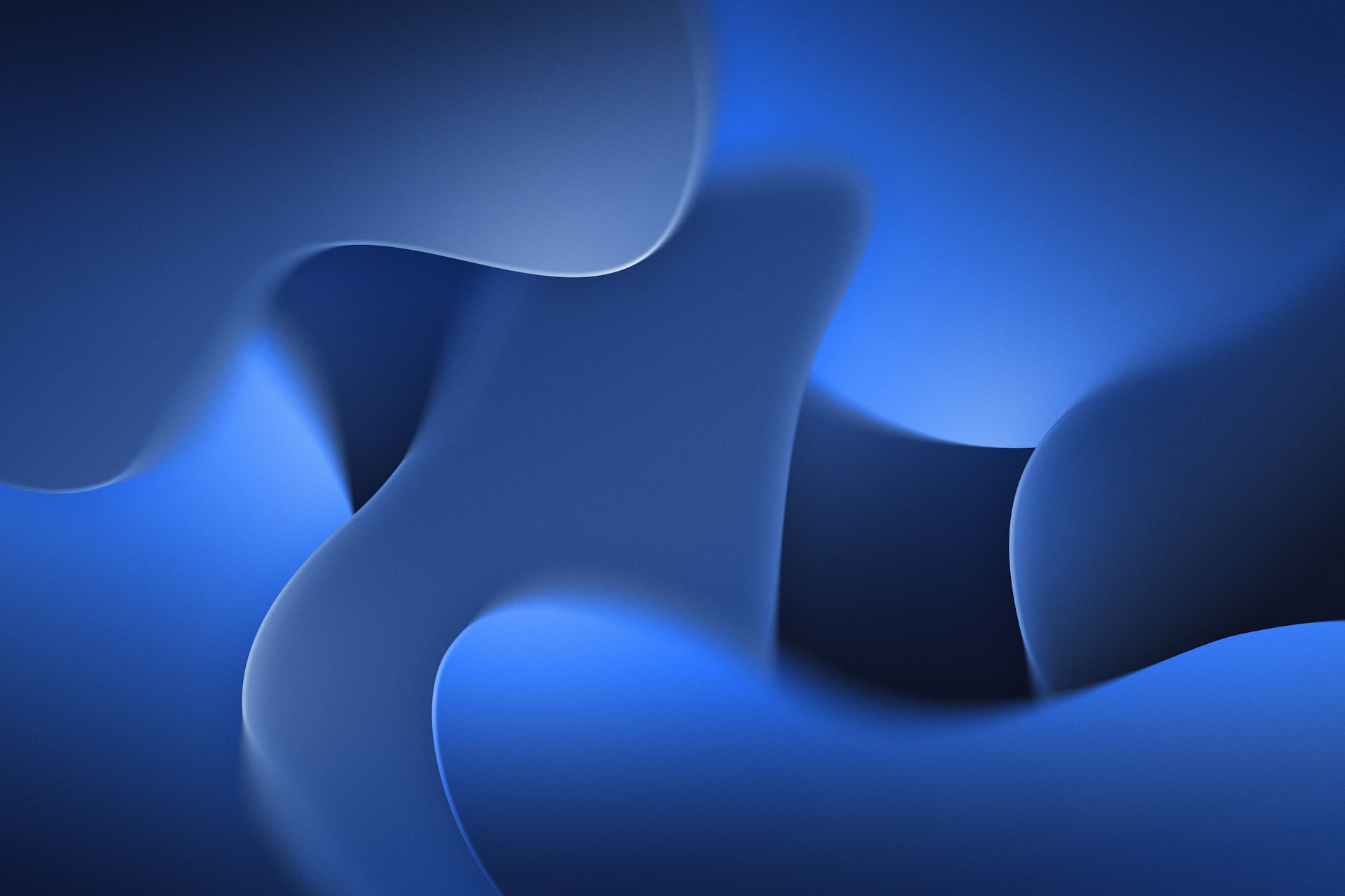 a blue abstract background with wavy shapes