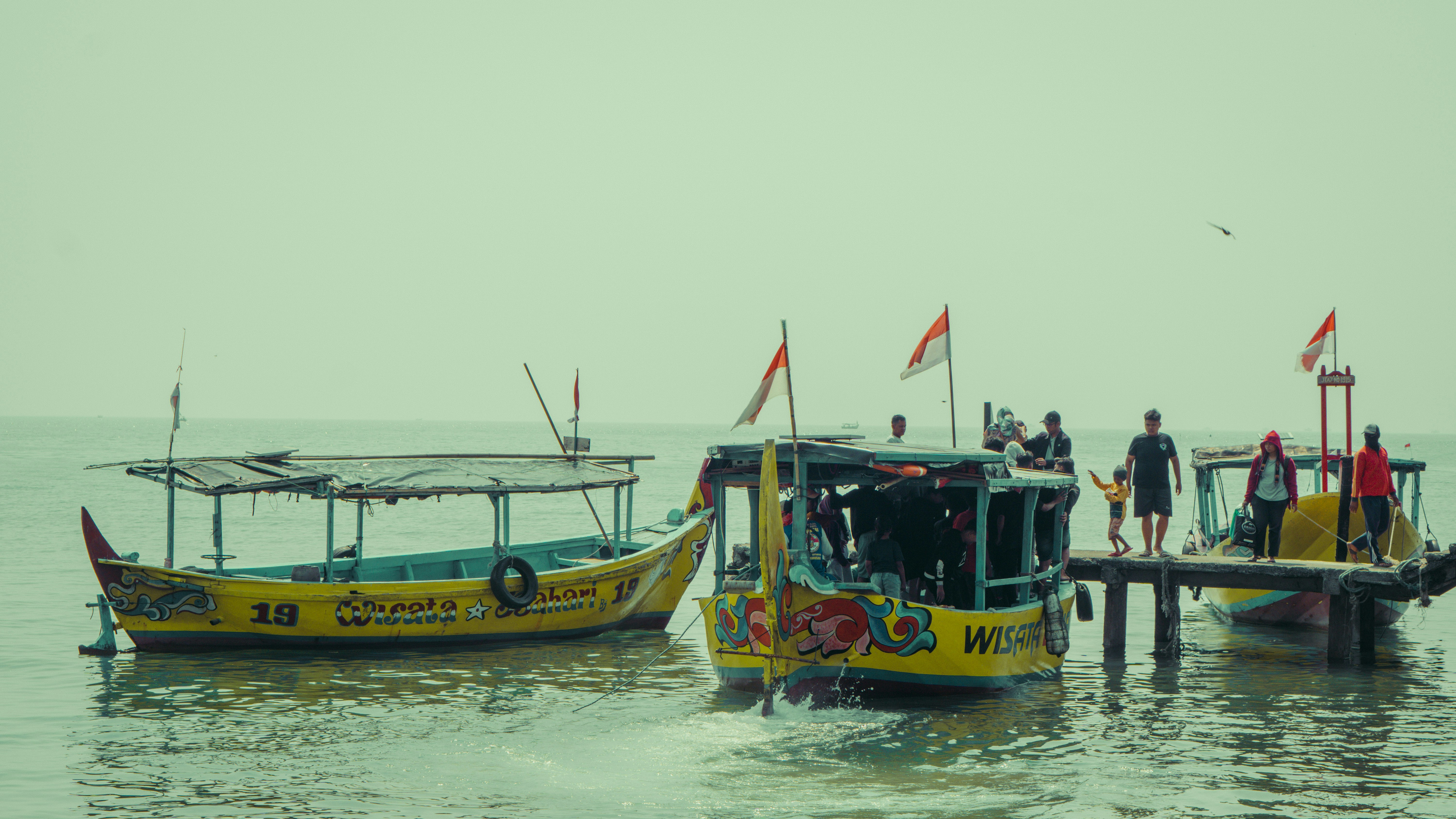 a couple of boats that are in the water