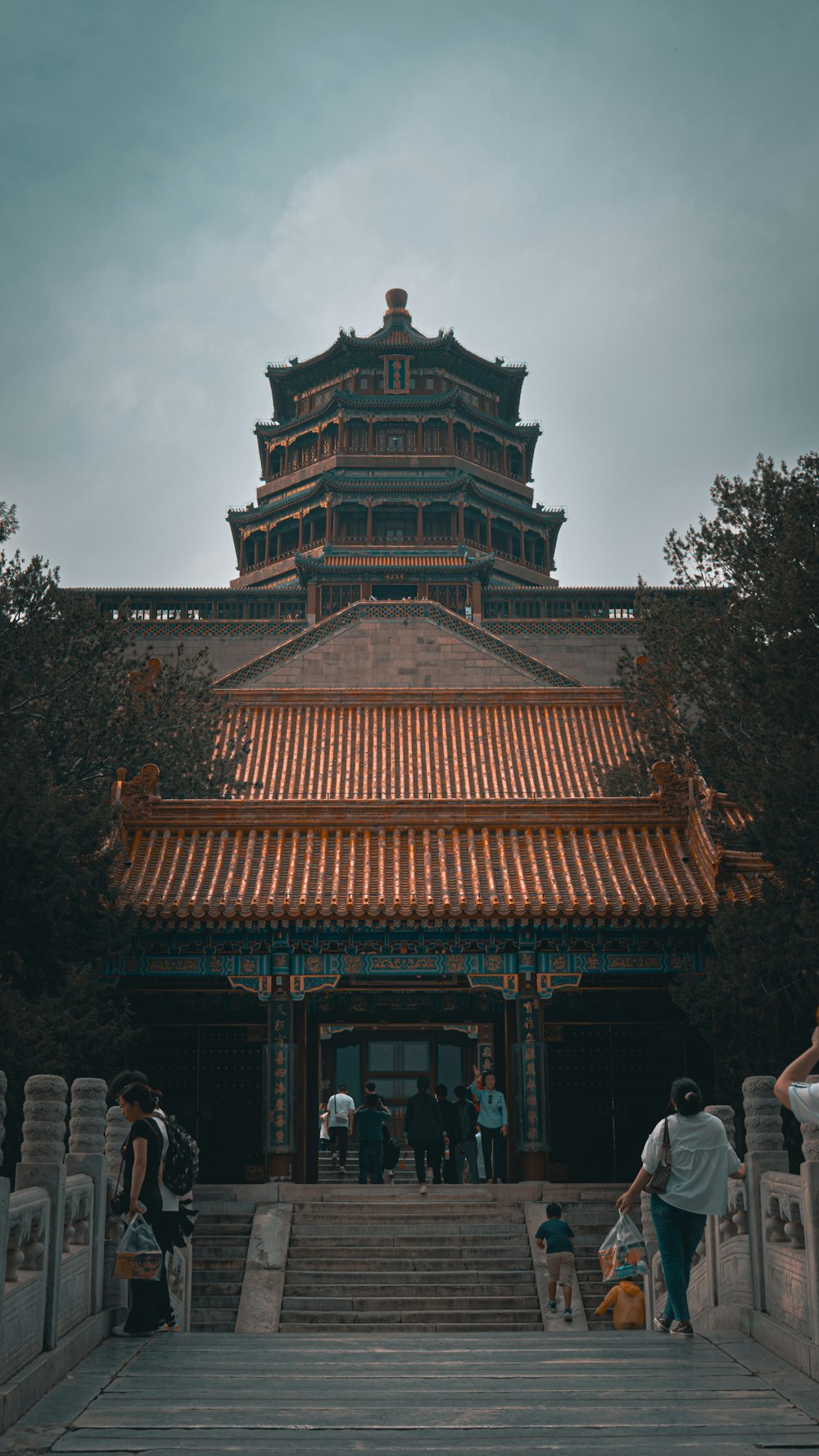 a group of people walking up a set of stairs