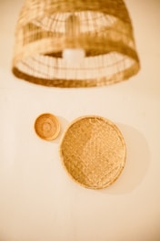 a hat and a basket on a table