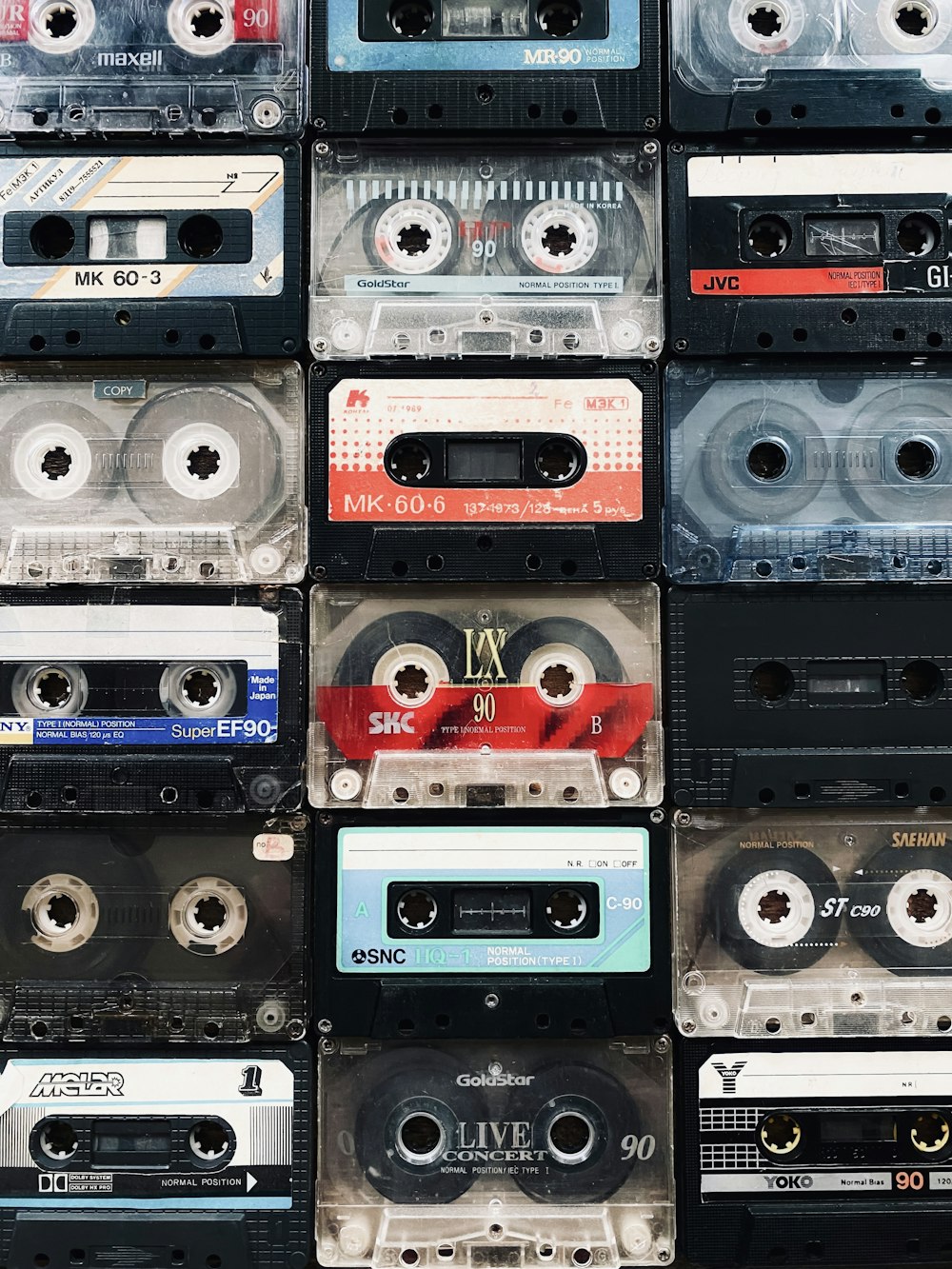 a bunch of cassettes stacked on top of each other