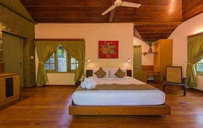 A cozy bedroom setup featuring elegant wooden furniture from Verde's collection.